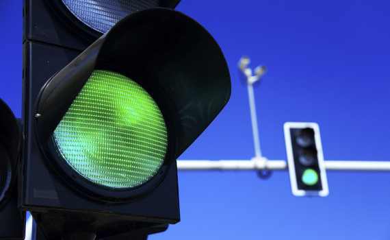 Traffic lights over blue sky